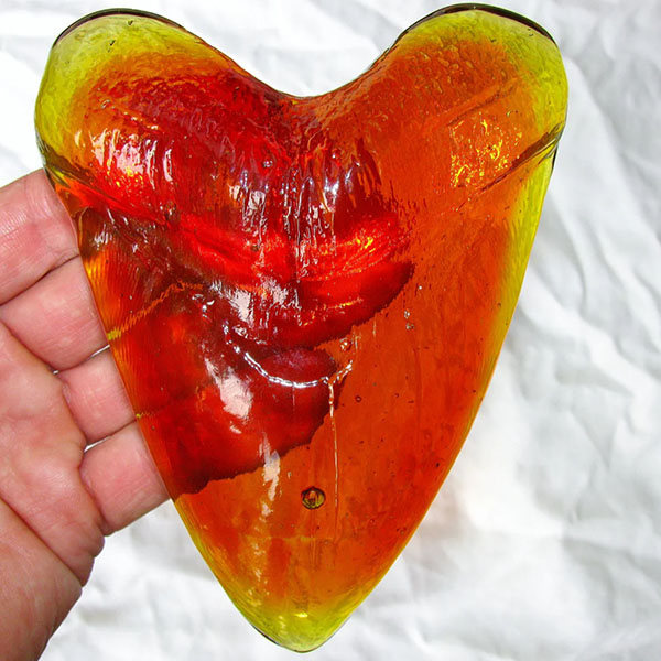 Meg tooth glass in red amber colour